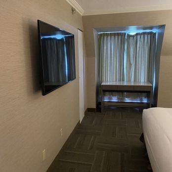 Chateau Cartier - TV and bedroom area - Hotels Near Me - Gatineau, Quebec