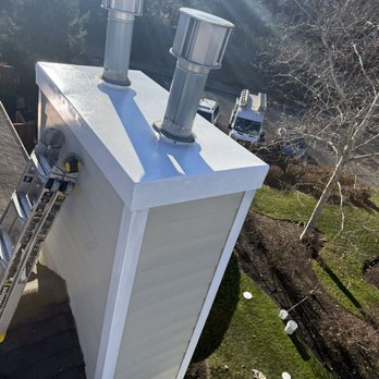 CKG Contractors - Replacing a rusty chimney cap is a critical "preventative" repair. Rust on the cap usually means the protective coating has failed. - Roofing Near Me - Parsippany, New Jersey CKG Contractors - Replacing a rusty chimney cap is a critical "preventative" repair. Rust on the cap usually means the protective coating has failed. - Roofing Near Me - Parsippany, New Jersey
