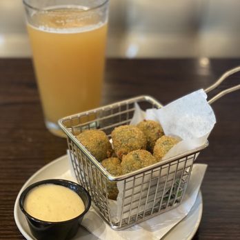 Wahlburgers - Spinach & Parmesan Wahlbites - Burgers Near Me - Springfield, Massachusetts Wahlburgers - Spinach & Parmesan Wahlbites - Burgers Near Me - Springfield, Massachusetts
