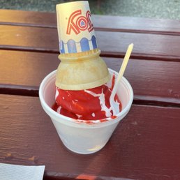 an ice cream cone in a cup