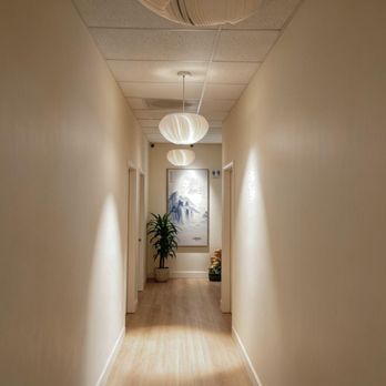 Perfect Healing Massage Therapy - Clean bright hallway lined with private massage rooms, soft hanging lights and calm warm decor leading to all our wellness treatment suites. - Massage Therapy Near Me - Los Altos, California Perfect Healing Massage Therapy - Clean bright hallway lined with private massage rooms, soft hanging lights and calm warm decor leading to all our wellness treatment suites. - Massage Therapy Near Me - Los Altos, California