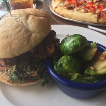 Olde Hickory Station - Brisket with jalapeño kale slaw and Bama sauce, with Bacon Brussels on the side! - New American Near Me - Hickory, North Carolina