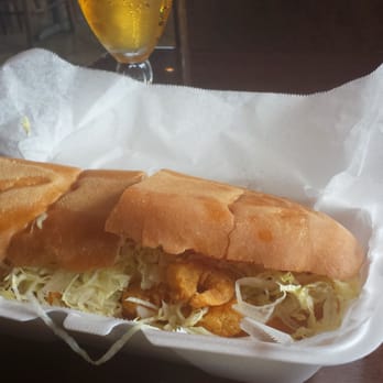 Po Boy Express - Shrimp po'boy washed down with a Stella - Seafood Near Me - Baton Rouge, Louisiana Po Boy Express - Shrimp po'boy washed down with a Stella - Seafood Near Me - Baton Rouge, Louisiana