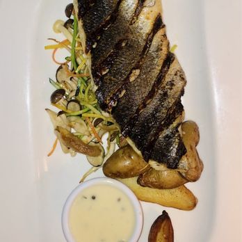 Metuchen Inn - Seared Branzino Filet with mushrooms $38 - New American Near Me - Metuchen, New Jersey Metuchen Inn - Seared Branzino Filet with mushrooms $38 - New American Near Me - Metuchen, New Jersey