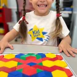 Baby Stars - Tangram games enhance spatial skills and creativity, a favorite activity in our preschool for young learners!