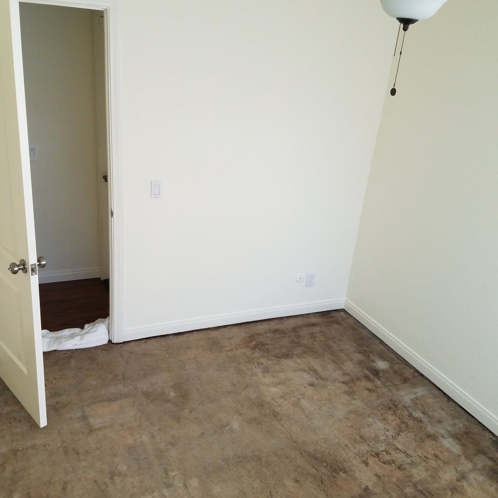 Concrete floor after mastic removed