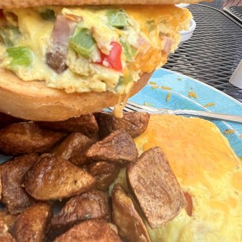 Toast - Milwaukee - Loaded Omelet with sourdough bread and potatoes - Breakfast & Brunch Near Me - Milwaukee, Wisconsin Toast - Milwaukee - Loaded Omelet with sourdough bread and potatoes - Breakfast & Brunch Near Me - Milwaukee, Wisconsin