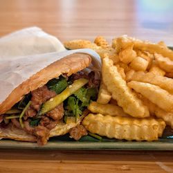 Fusion Fare Restaurant - Beef roujiamo "Chinese burger", steak fries with chili powder