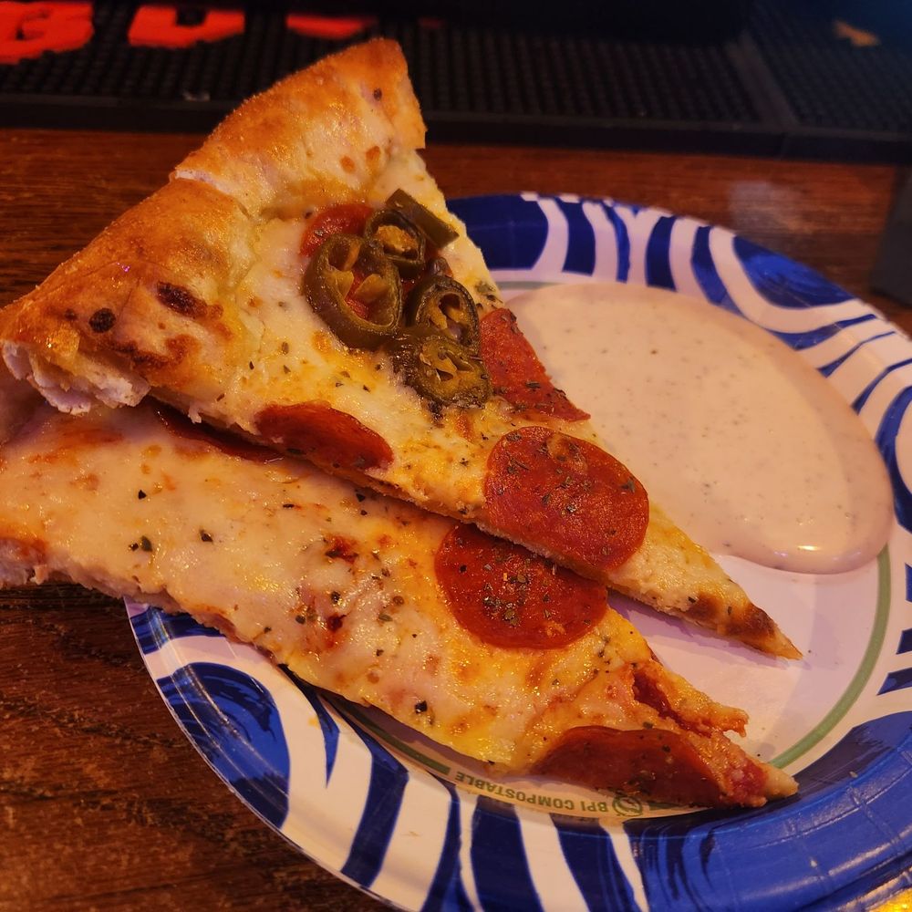 The Mad Hatter - Mama's Pizza for snacks - Pubs Near Me - Fort Worth, Texas The Mad Hatter - Mama's Pizza for snacks - Pubs Near Me - Fort Worth, Texas