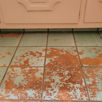 Bio-One of Orange - The bathroom floor under the rug that was there -after they said they had cleaned it. - Damage Restoration Near Me - Orange, California