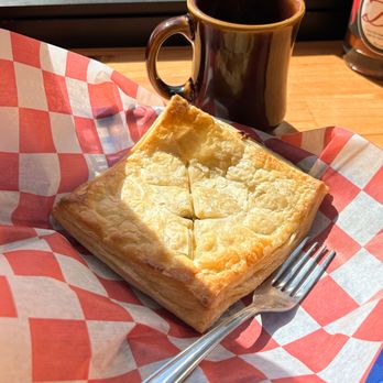 Slap Shot - Sausage Strudel and a cup of Velodrome coffee - Breakfast & Brunch Near Me - Negaunee, Michigan Slap Shot - Sausage Strudel and a cup of Velodrome coffee - Breakfast & Brunch Near Me - Negaunee, Michigan