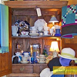 Harmony by the Bay - Tea cups, trays, blankets and hats artfully arranged in the Dining Room