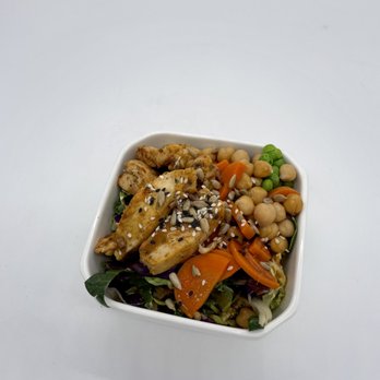 Alua's Thrive Bar - Miso Mountain Bowl - Brussel sprouts, peas, carrots, garbanzo beans, kale, and wonton chips on a rice and cabbage base w/ miso ginger sauce. - Juice Bars & Smoothies Near Me - Mount Shasta, California Alua's Thrive Bar - Miso Mountain Bowl - Brussel sprouts, peas, carrots, garbanzo beans, kale, and wonton chips on a rice and cabbage base w/ miso ginger sauce. - Juice Bars & Smoothies Near Me - Mount Shasta, California
