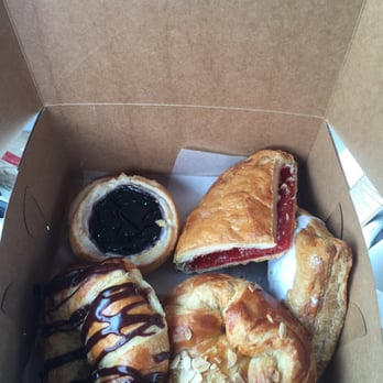 Moreno Bakery - Cherry turnover, guava turnover, almond and chocolate croissant and a cookie with a marzipan ring and blueberry filling! - Bakeries Near Me - Brandon, Florida