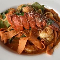 The Fish Hopper - Ultimate Seafood Pasta with marinara sauce instead of lobster cream sauce