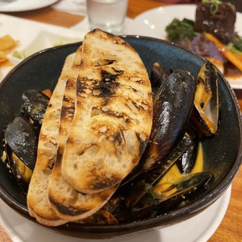 Tommy Bahama - Steamed Chilean blue mussels - Seafood Near Me - Kihei, Hawaii Tommy Bahama - Steamed Chilean blue mussels - Seafood Near Me - Kihei, Hawaii