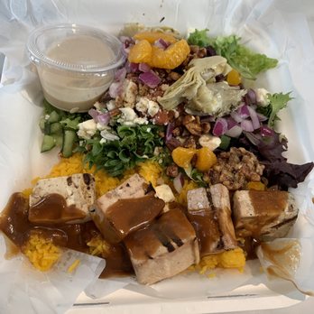 Tazā - Tofu skewer with citrus peanut sauce on saffron rice and a salad. - Mediterranean Near Me - Chanhassen, Minnesota Tazā - Tofu skewer with citrus peanut sauce on saffron rice and a salad. - Mediterranean Near Me - Chanhassen, Minnesota