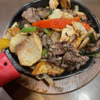 Casa Soto - Steak and chicken fajitas (they have a delicious thin slice of potato's with zucchini vegetables - Mexican Near Me - Weatherford, Oklahoma
