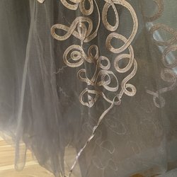 Tina's Bridal - Design completely coming off.