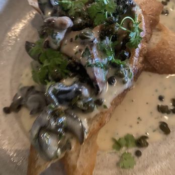 The Ravenous Pig - Escargot toast - New American Near Me - Winter Park, Florida The Ravenous Pig - Escargot toast - New American Near Me - Winter Park, Florida