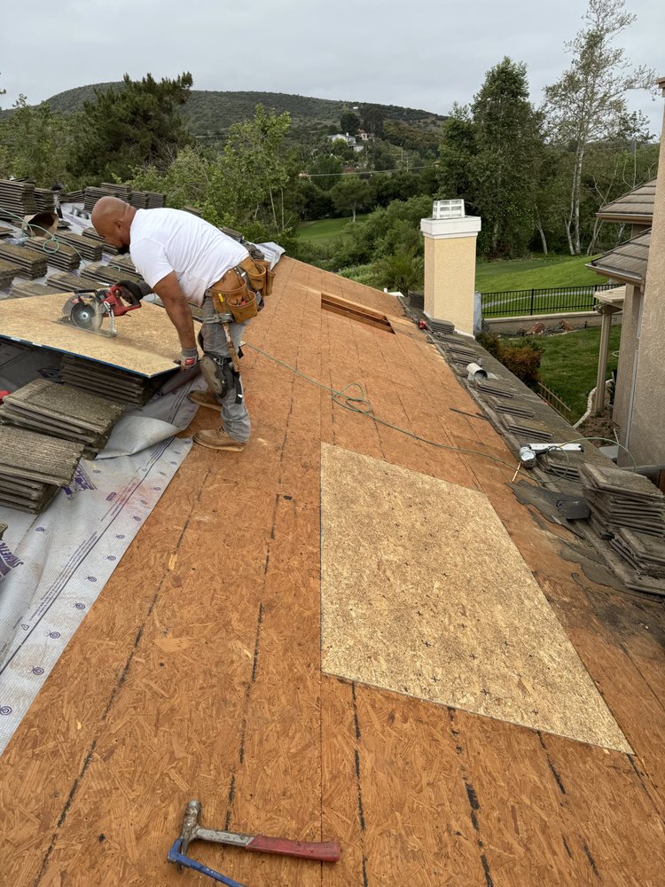 Slide of Millennium Roofing