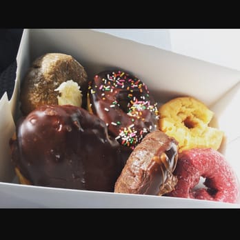 Jupiter Donuts Royal Palm - Blueberry cream cheese, chocolate sprinkled, plain, Boston cream, snickers, and red velvet. - Donuts Near Me - Royal Palm Beach, Florida