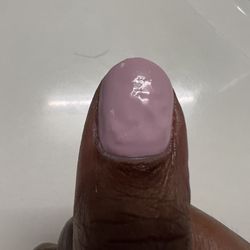Basecoat Nail - There's fluid or something underneath one of the layers of polish. It moves if you push on it.