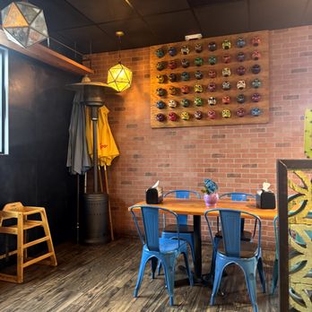 Crack Taco Shop - Cozy Seating and Wall Decor at Crack Taco Shop Cassandra Bankson - Tacos Near Me - San Diego, California