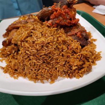 Fufu Catering kitchen &GRILL - a plate of rice and meat - African Near Me - Norcross, Georgia Fufu Catering kitchen &GRILL - a plate of rice and meat - African Near Me - Norcross, Georgia