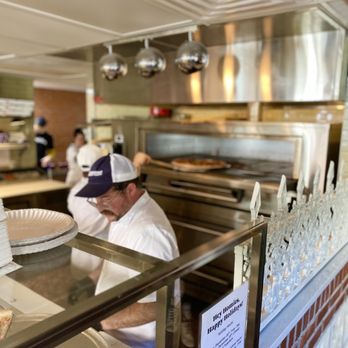 Home Slice Pizza - Making the magic! - Pizza Near Me - Houston, Texas