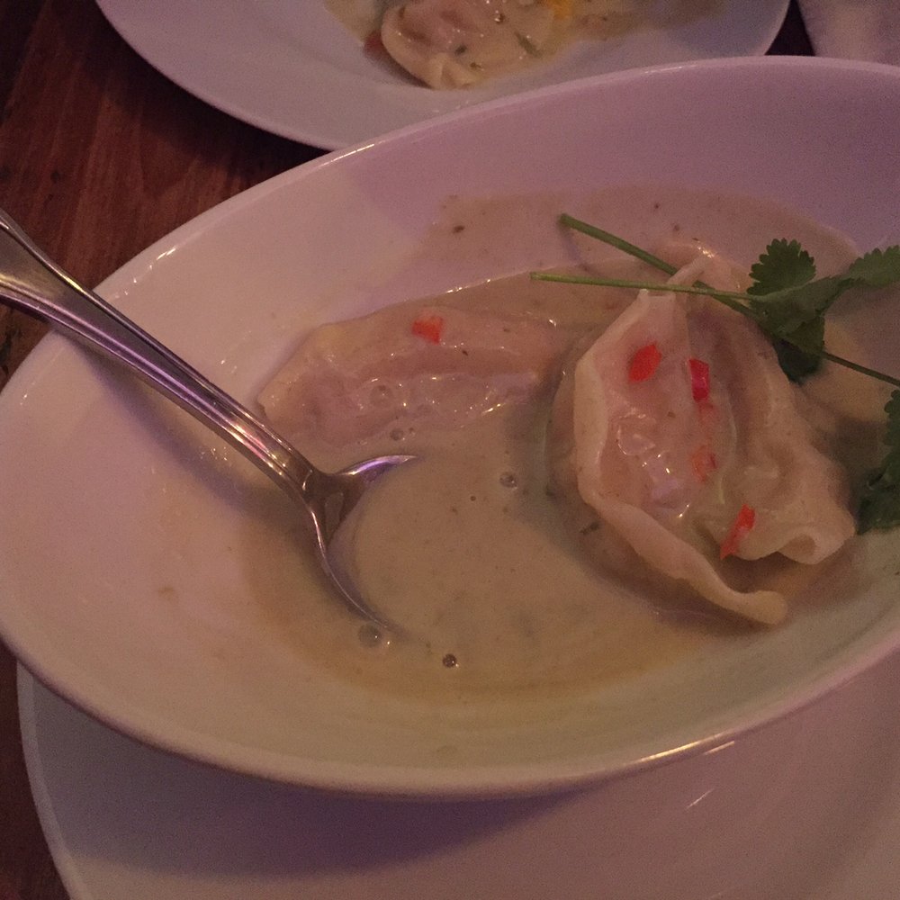 Summer Buffalo - Appetizer - Steamed dumpling with green curry sauce.  Chicken and veggie dumplings served with spicy coconut curry. - Thai Near Me - Burbank, California