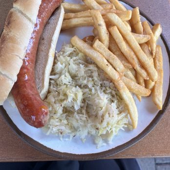 Rhein Haus - Habanero cheddar sausage on a bun with fries and sauerkraut (yum) - German Near Me - Leavenworth, Washington Rhein Haus - Habanero cheddar sausage on a bun with fries and sauerkraut (yum) - German Near Me - Leavenworth, Washington