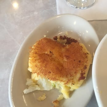 Harry's Restaurant - This is a potato pattie with cheese and onion and it is delicious. Sorry, I took a bite before I thought to snap a pic. - Breakfast & Brunch Near Me - Houston, Texas