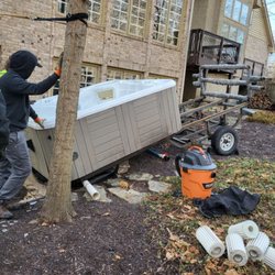 Two Guys and a Spa Dolly - Move my hot tub? Call us and find out how easy It really is and affordable to have us do it for you.
