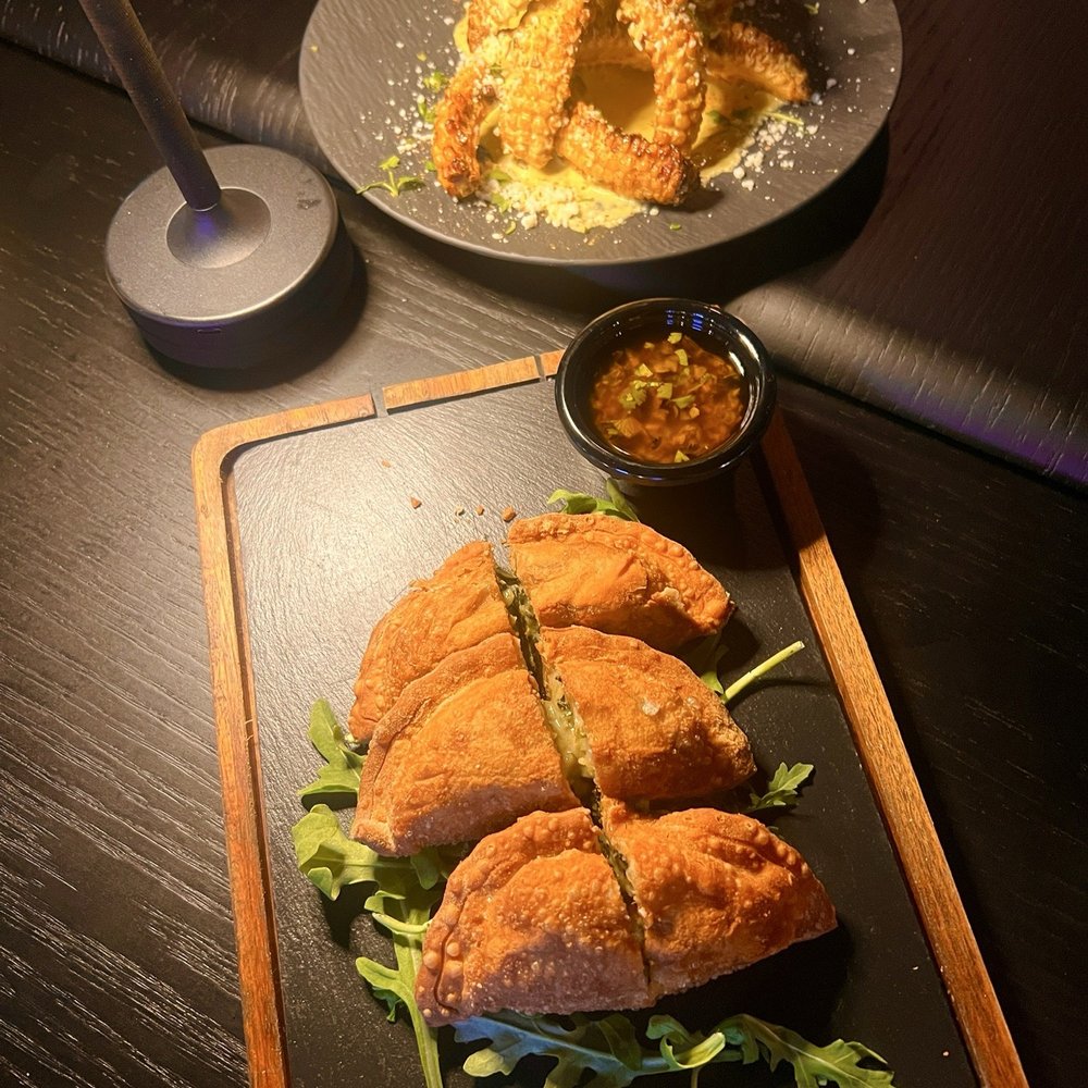 Westso - Empanadas and elotes corn ribs - Steakhouses Near Me - Chicago, Illinois