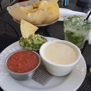 Holy Taco - A delicious trio of dips with chips and a Mojito - Mexican Near Me - Atlanta, Georgia