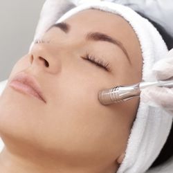 Modern Skin and Body - Microdermabrasion, a manual exfoliation to help with pigmentation and skin texture. leaving the skin even tone and revitalized.