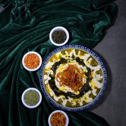 Darbar Persian Grill - Ash Reshteh


Vegetarian. Ash Reshteh is a delicious Iranian thick soup made of onion, chickpeas, pinto beans, lentils, herbs and noodles