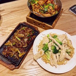 Sizzling ginger beef, spicy shrimp and chicken dry pot and chicken chowmein Sizzling ginger beef, spicy shrimp and chicken dry pot and chicken chowmein