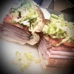 Uncle Af's - Cold Cut ( baguette, mayo , Provolone, black forest ham, Mortadella, Salami, raw onions, tomatoes, shredded lettuce, balsamic vinegar)