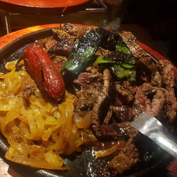 Lupe Tortilla Mexican Restaurant - Sizzling beef fajitas (comes with rice, refried beans and tortillas) - Tex-Mex Near Me - Hedwig Village, Texas