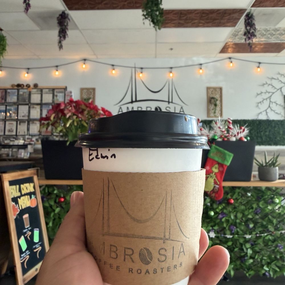 Ambrosia Coffee Roasters - To go Cortado . Love the logo - Coffee & Tea Near Me - Wilmington, California