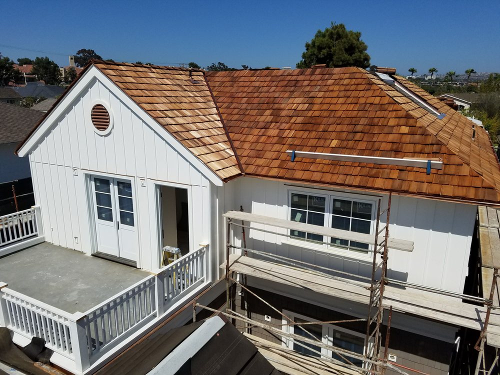 Slide of Rational Roofing Services