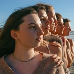 Rooted Reverie Wellness - A moment of stillness, strength, and sisterhood--anchored by sun, sea, and shared intention.