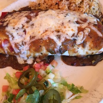 Chuy's - Fajita burrito with hatch chile sauce - Mexican Near Me - San Antonio, Texas Chuy's - Fajita burrito with hatch chile sauce - Mexican Near Me - San Antonio, Texas