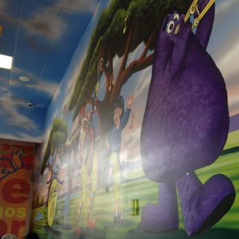 McDonald's - a mural of a purple monster - Burgers Near Me - Laredo, Texas