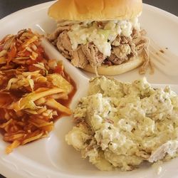 Holy Smokes BBQ of TN - Pork sandwich, hot slaw, loaded baked potato salad.