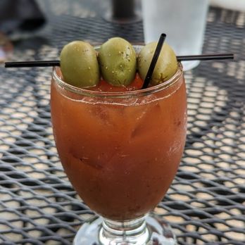 Europa Bar & Cafe - a bloody drink with olives - Modern European Near Me - Greensboro, North Carolina Europa Bar & Cafe - a bloody drink with olives - Modern European Near Me - Greensboro, North Carolina