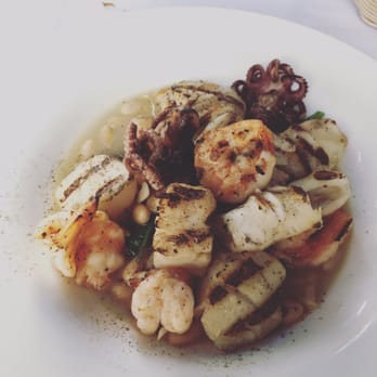 Torino Restaurants - Grilled Seafood over Spinach and white beans. - Italian Near Me - Metuchen, New Jersey Torino Restaurants - Grilled Seafood over Spinach and white beans. - Italian Near Me - Metuchen, New Jersey
