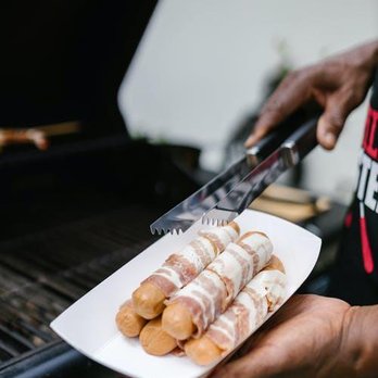 Ray's Sausage - a person holding a plate of sausages - Meat Shops Near Me - Cleveland, Ohio Ray's Sausage - a person holding a plate of sausages - Meat Shops Near Me - Cleveland, Ohio